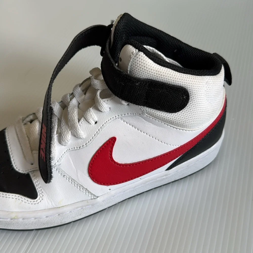 Nike Kids High-Top Sneakers - White, Black, and Red. Size 7
